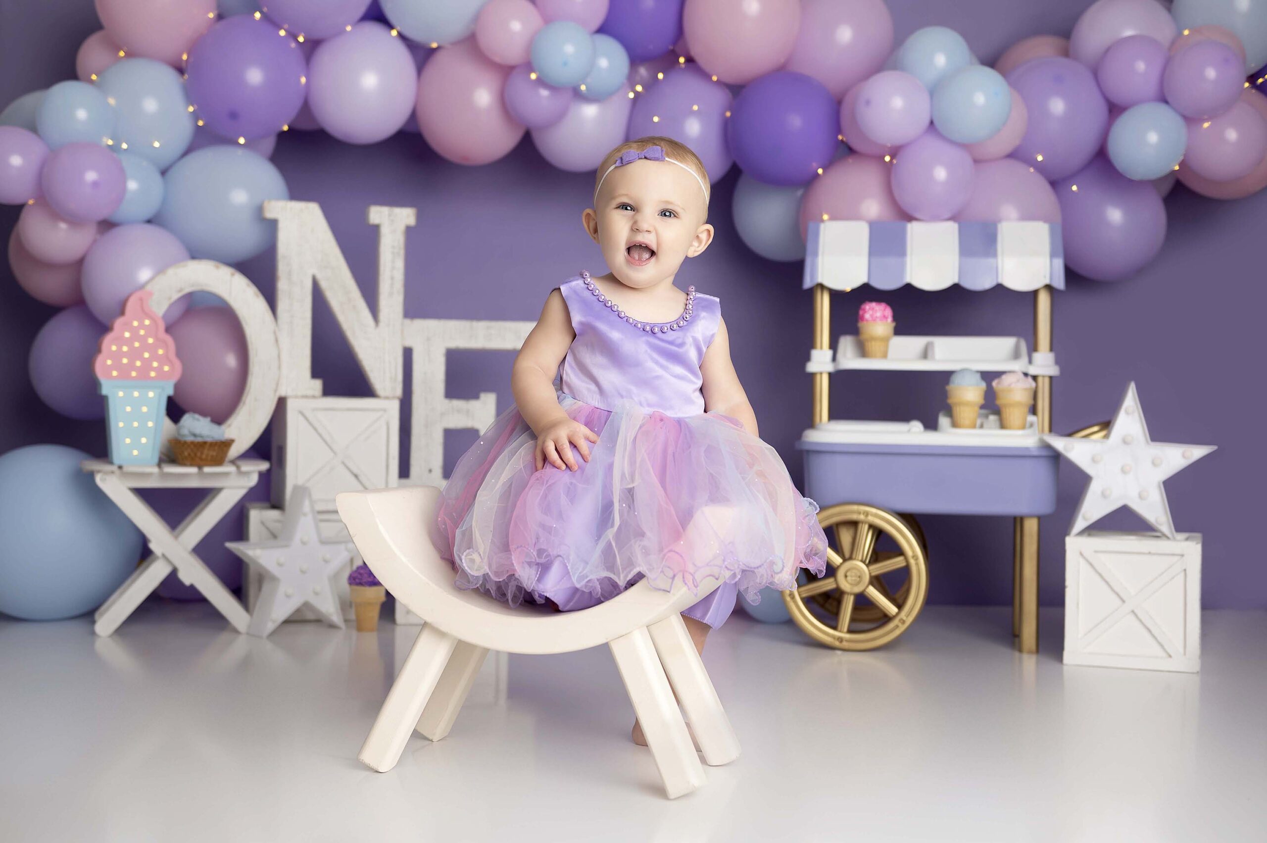 Lewisville-Flower-Mound-Denton-cake-smash-photography-first-birthday-one-year-old-girlice-cream-cart-purple-pink
