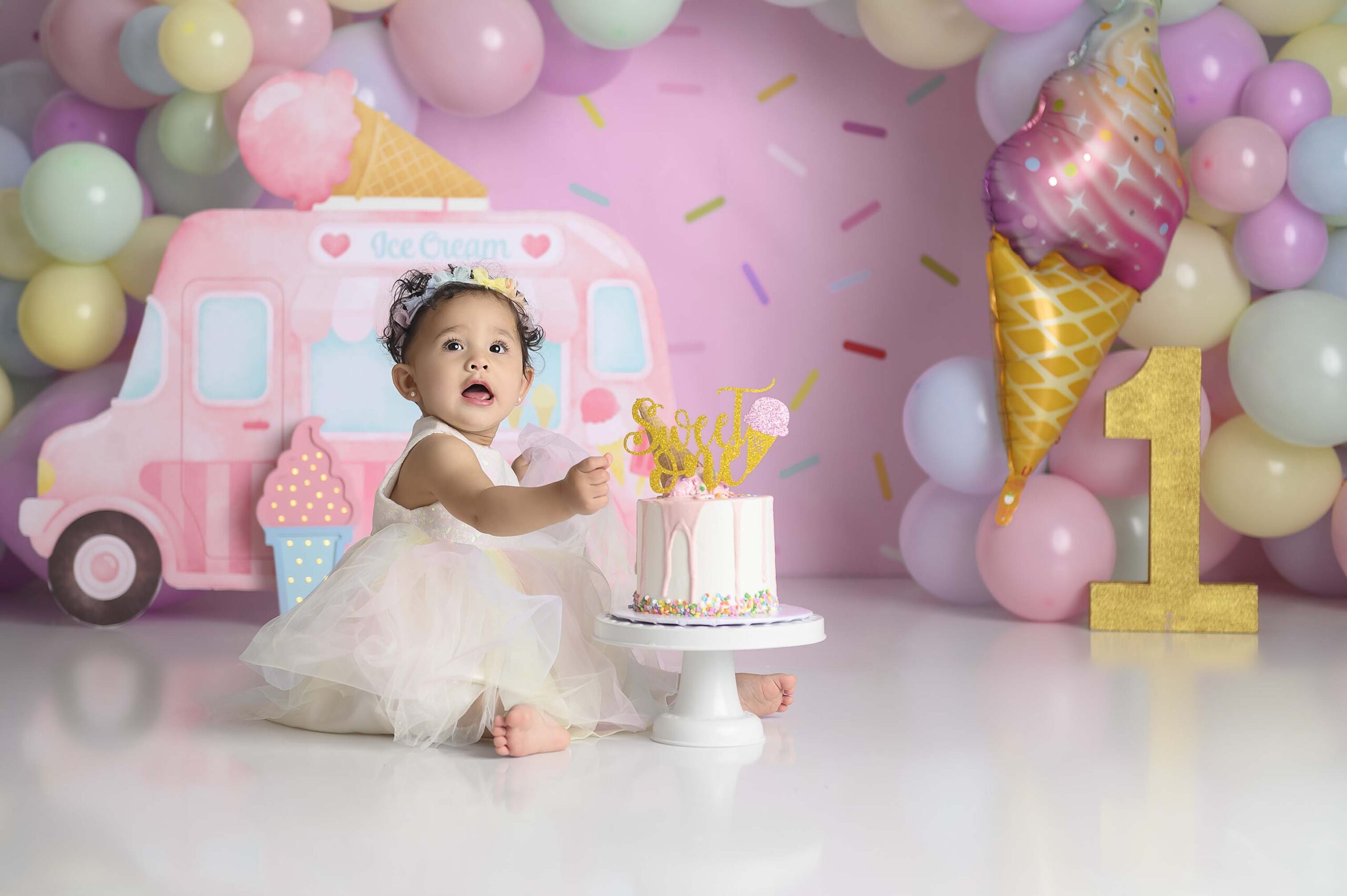 Roanoake-Trophy-Club-Southlake-cake-smash-photography-first-birthday-one-year-old-girlice-cream-pink-truck-rainbow
