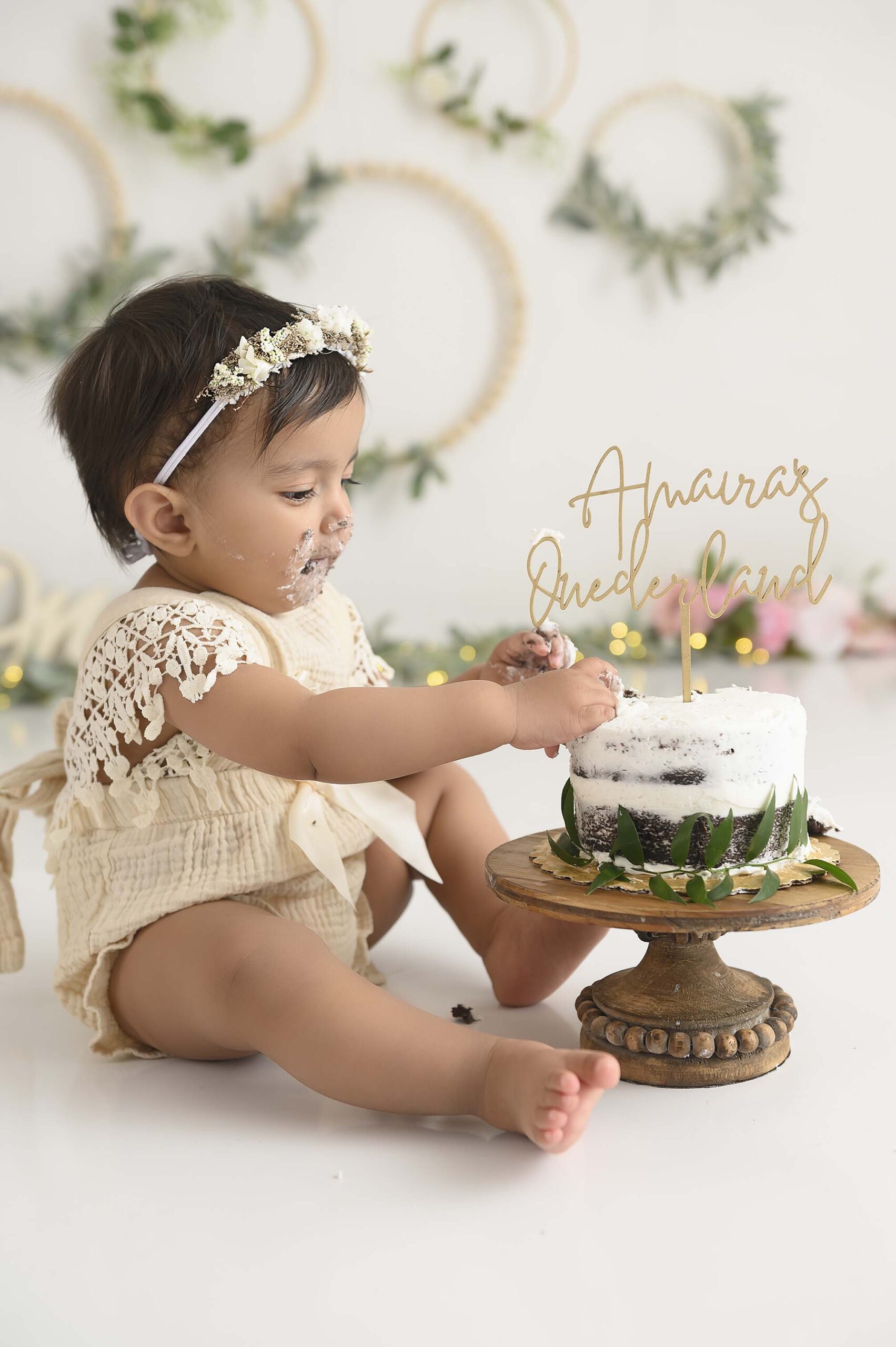 Southlake-Colleyville-smash-cake-photographer-one-year-old-first-birthday-simple-floral-baby-girl-pink-tutu